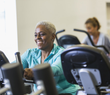 older woman on exercise bike