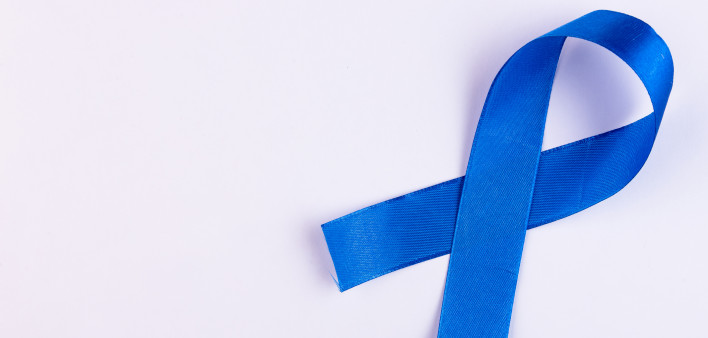 Blue ribbon on a white background. Colon cancer