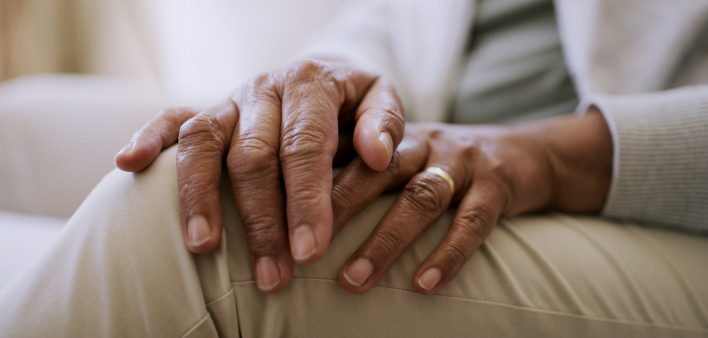 Of a senior woman's hands while sitting at home