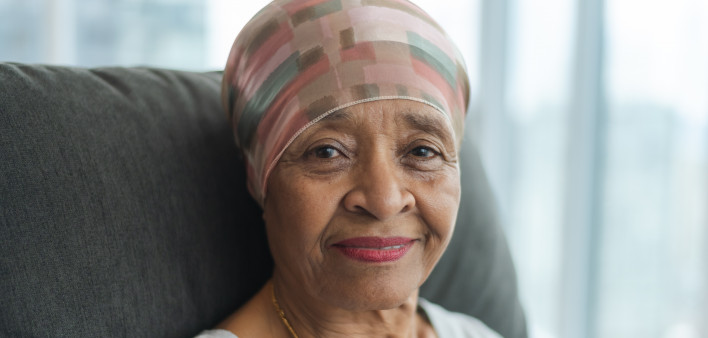 Portrait of a contemplative senior woman with cancer