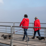 Portugal man living with HIV with a taller man walking