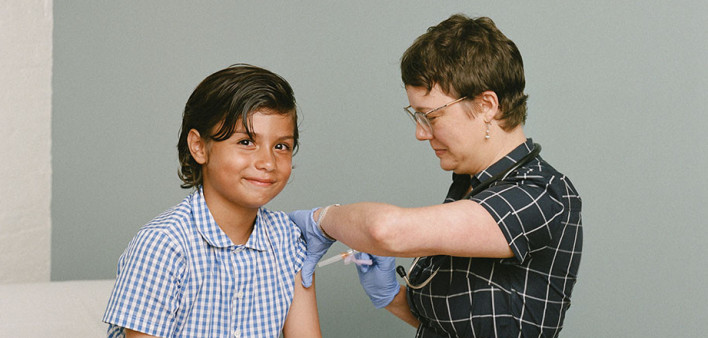 boy receives a vaccine
