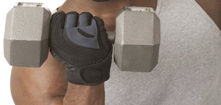 an African American man doing a bicep curl with a dumbell