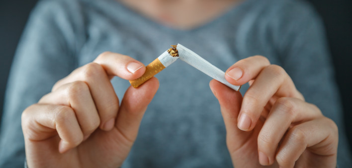hands break cigarette quite smoking