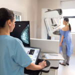 mammogram tech and patient