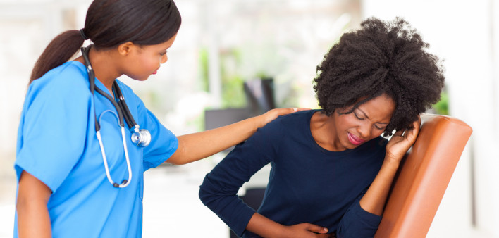woman girl stomach cramps with nurse