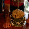 Adam poses with his fourth “cranniversary” cake on May 26, 2020. Cake by Moist Cake Co.