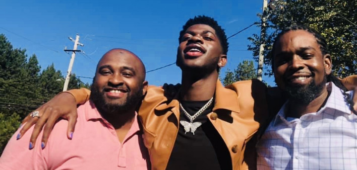 Lil Nas X, center, with THRIVE SS founders Dwain Bridges, left, and Larry Walker