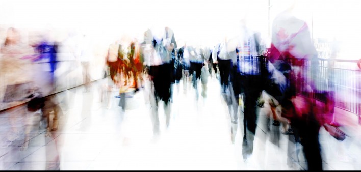 blurred abstrat image of people on city street