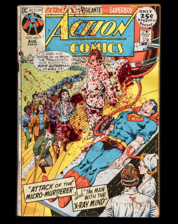 Untitled (detail), 2018, original 1971 Action Comics, used blood collection bag with needle, residual blood of gay man on PrEP; plexiglass, UV resin