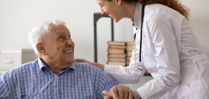 doctor happy conversation smilng with male patient
