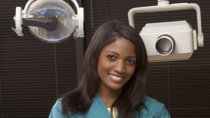 smiling female African-American dentist