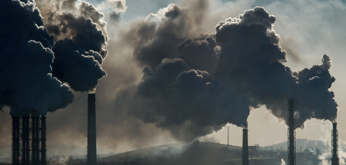 Ecological catastrophy smokestacks billowing smoke