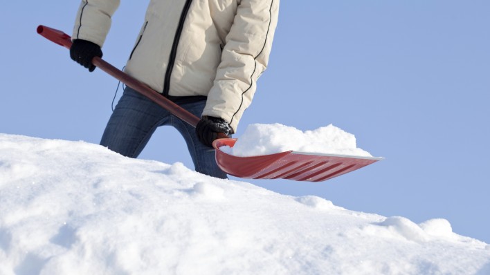 a person shoveling snow