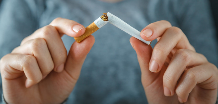 hands break cigarette quite smoking