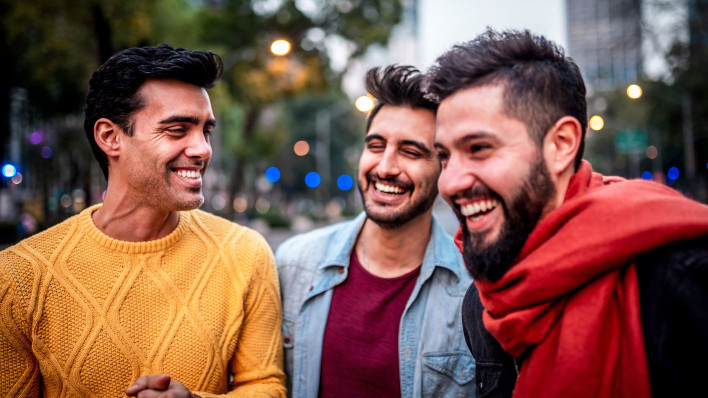 three friends young men laughing fun