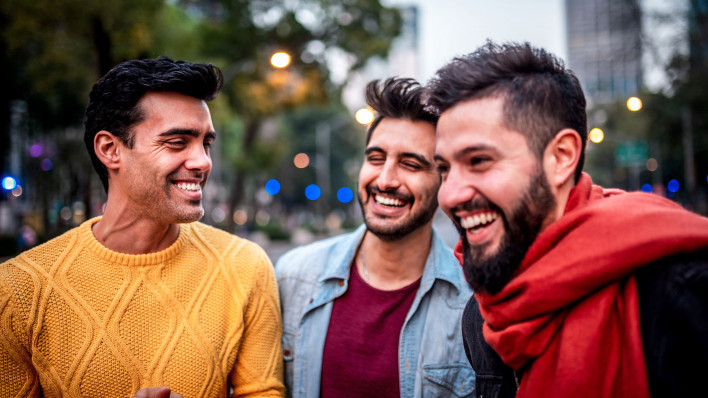 three friends young men laughing fun