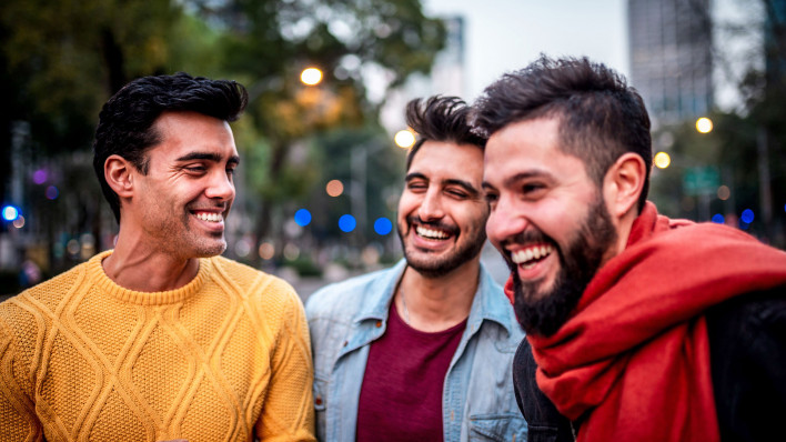 three friends young men laughing fun