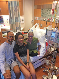Kellie Smith in the hospital, with her family