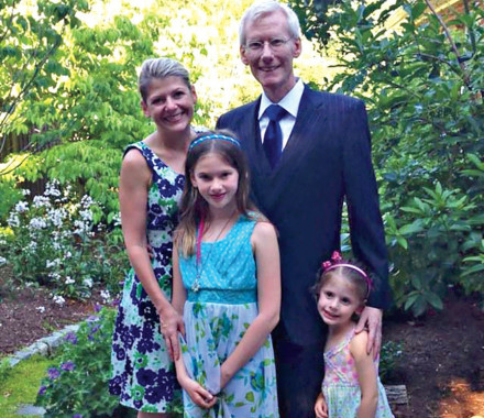 Dena Battle and her late husband, Chris Battle, with their daughters