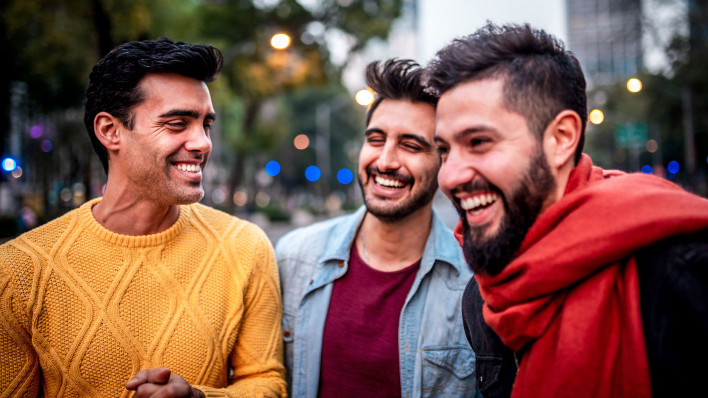 three friends young men laughing fun