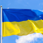 Flag of Ukraine on a background of blue sky