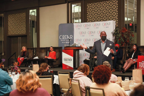 Magic Johnson at a Clear Health Alliance and Simply Healthcare NBHAAD event.