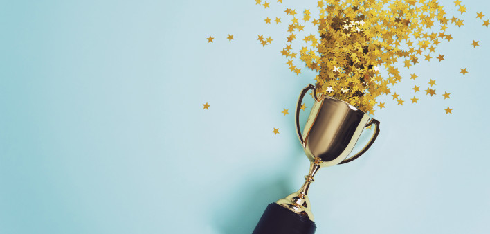 trophy with stars coming out