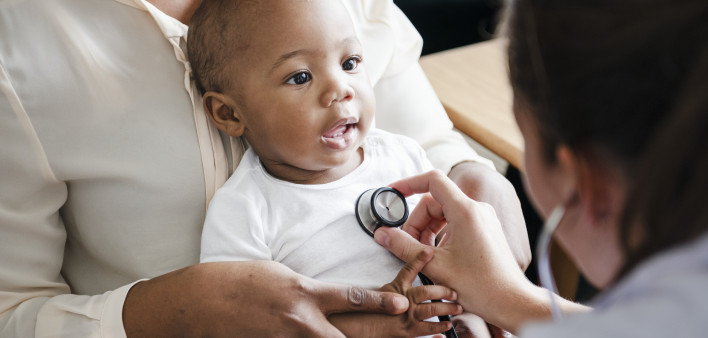 baby and doctor stethoscope