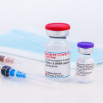Pfizer BioNTech and Moderna Covid-19 vaccine on a white background.