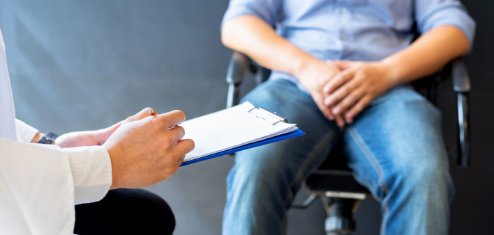 Male doctor and prostate cancer patient are discussing about prostate cancer test report. Diagnostic, prevention of men diseases,