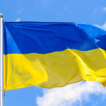 Flag of Ukraine on a background of blue sky