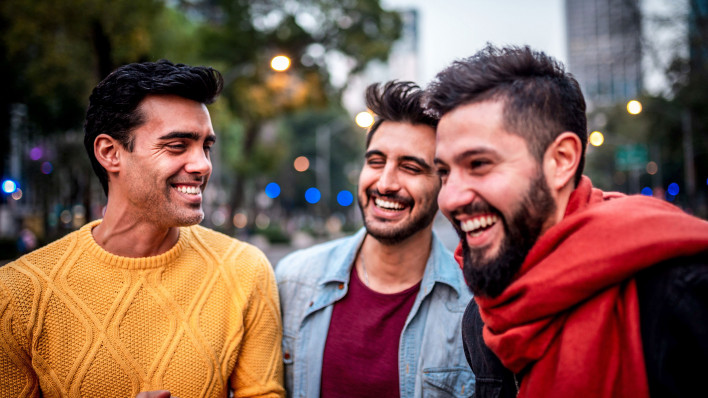 three friends young men laughing fun