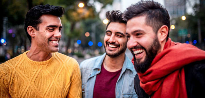 three friends young men laughing fun