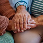 hands together three generations women