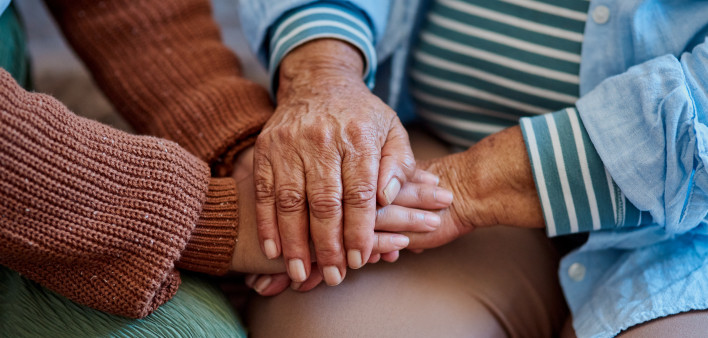 hands together three generations women