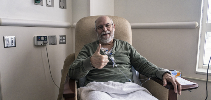 old man with beard giving thumbs up chemo therapy treatment