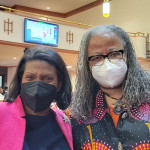 Keynote speaker Celeste Watkins-Hayes, left, with an attendee at Iris House’s 2022 Women as the Face of AIDS Summit.