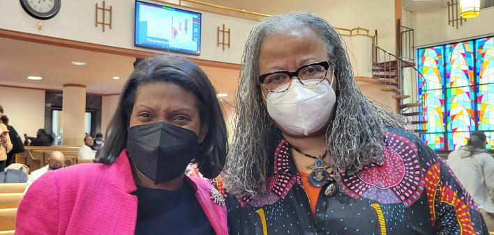 Keynote speaker Celeste Watkins-Hayes, left, with an attendee at Iris House’s 2022 Women as the Face of AIDS Summit.