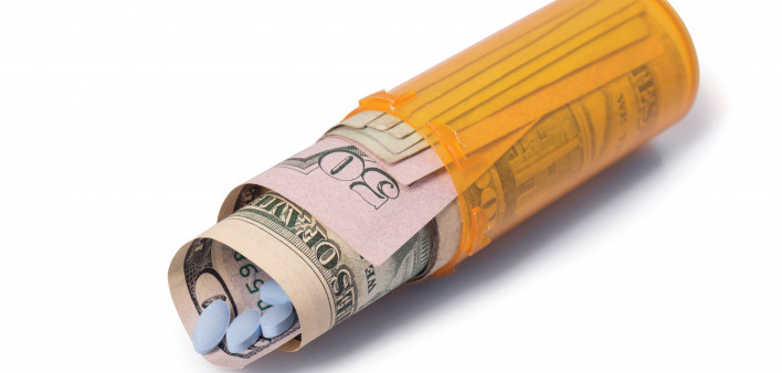 blue pills money pill bottle healthcare cost