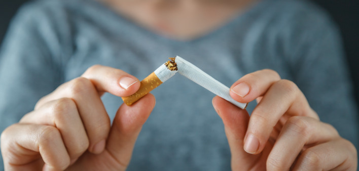 hands break cigarette quite smoking