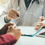 Doctor talking to the patient about menopause and treatment in future.