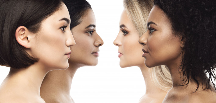 4 pretty women facing one another profiles