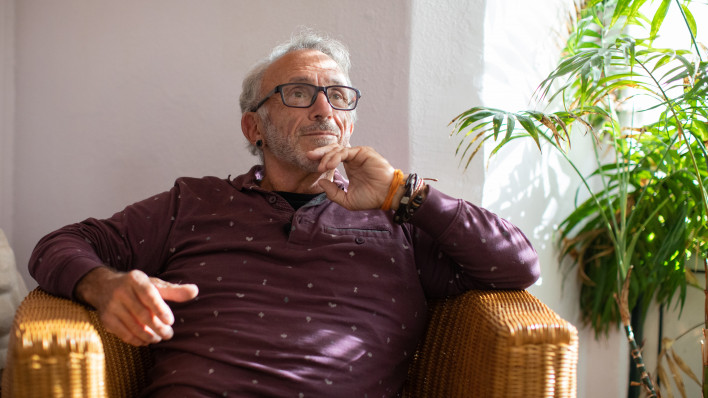 Portugal man living with HIV at work at home