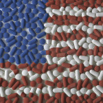 Medicated United States. An American flag made from red, white, and blue pills. US Healthcare reform background concept.