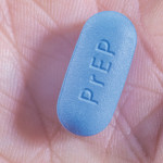 and hold blue pill with PrEP written