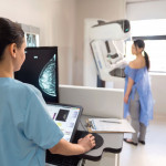 mammogram tech and patient