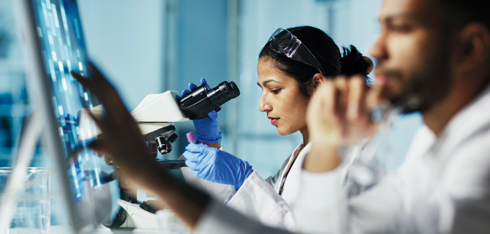 researchers working in the lab