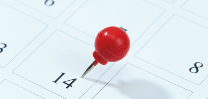 calendar with red pin on 14
