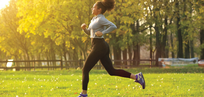 young woman running outdoors